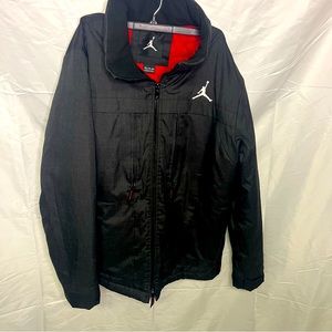 Jordan Jumpman winter jacket mens 2XL, black with a hidden zip hood.